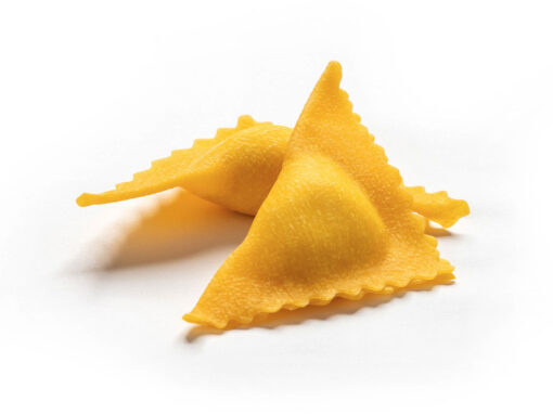 Triangoli al formaggio e spinaci