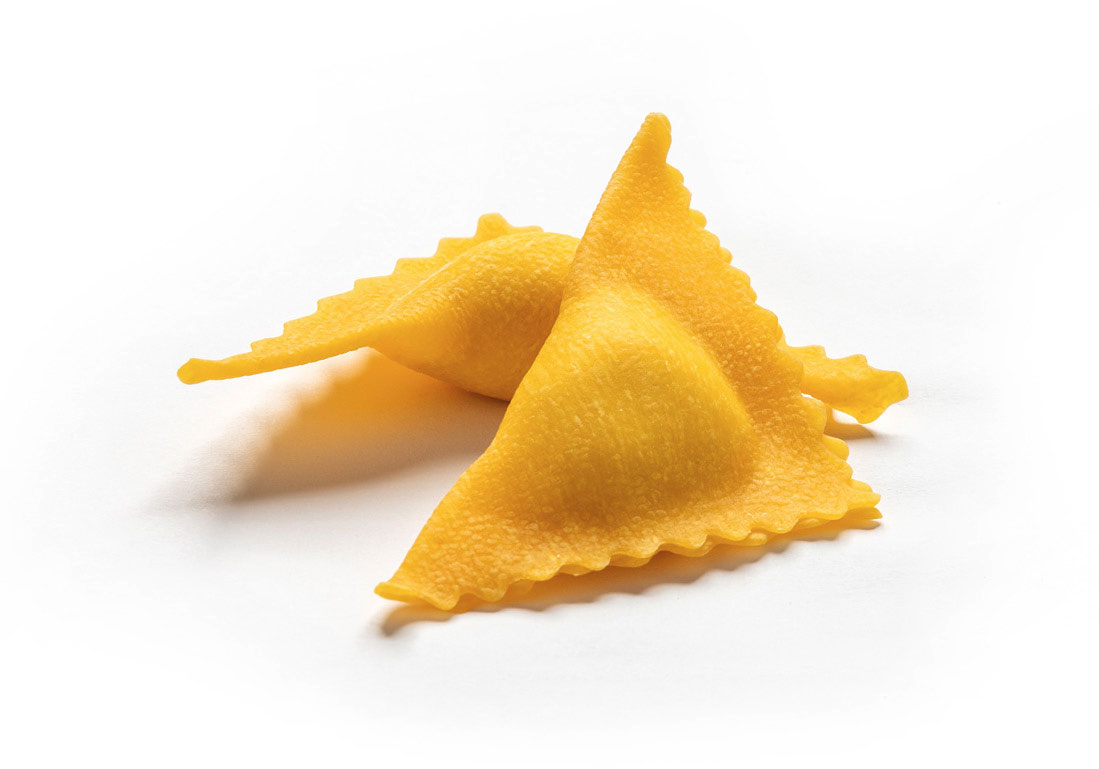 Triangoli al formaggio e spinaci